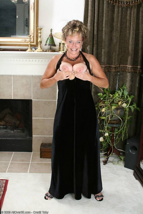 All Over 30 Mature and elegant Ariel strips off her black evening gown at AllOver30 porn pics