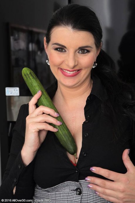 All Over 30 Sexy mature Sandra Nero playing with a cucumber at AllOver30 porn pics