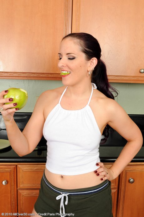 All Over 30 Hot 35 year old Caroline P making a green apple look very good at AllOver30 porn pics